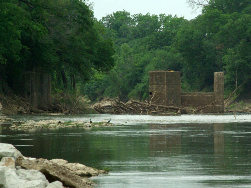 Notice the Double-crested Cormorants standing on the ruins of the 1893 lock and dam.