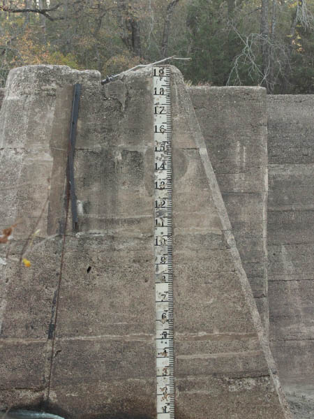 The depth gauge located on the side of the spillway.