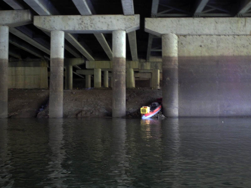 We noticed this kayak  parked under the I-35 bridge.  We did not see the operator.