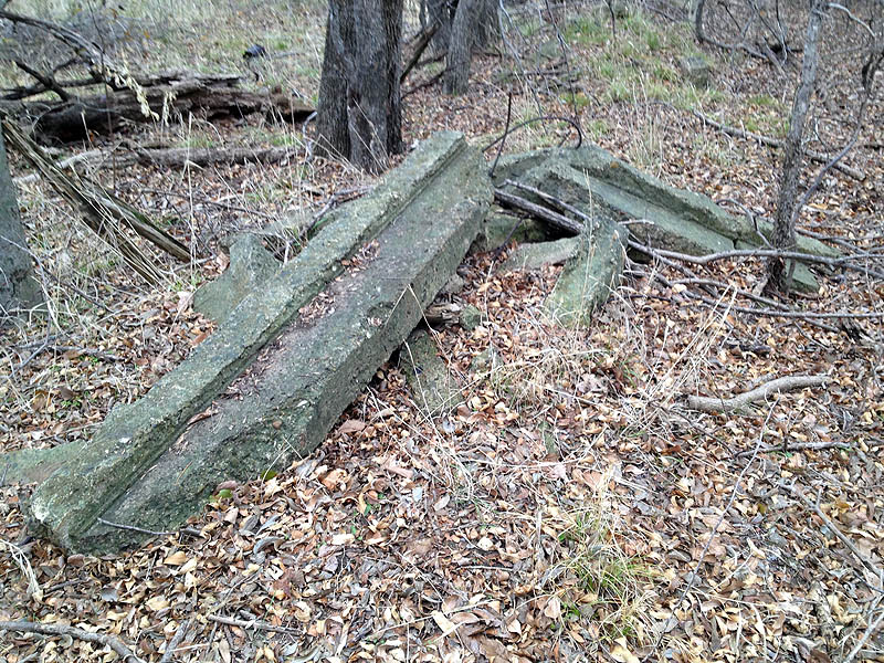 The remains of some discarded concrete structure.