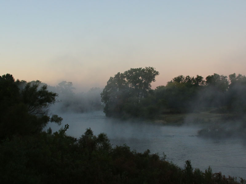 Fog rising off of the Elm Fork of the Trinity River at dawn.